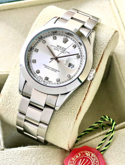 ROLEX OYSTER PERPETUAL DATE JUST - Timepieces of Distinction