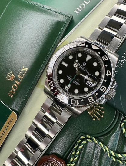 ROLEX - GMT Master Black & Gray Bezel Edition