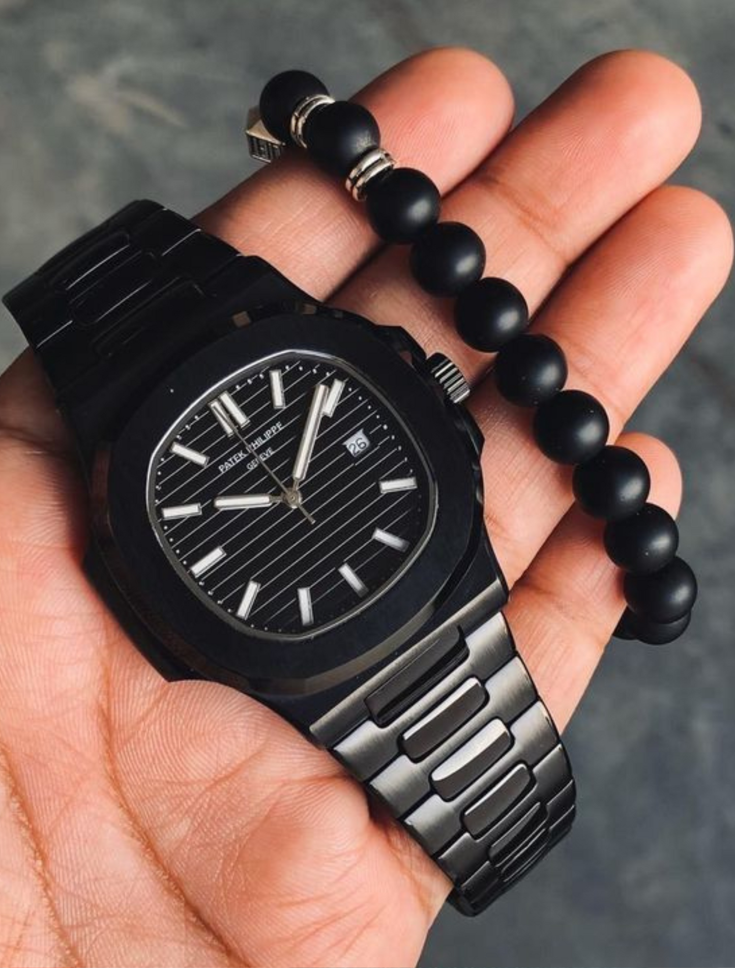 PATEK PHILIPPE QUARTZ - Nautilus Collection of Black Dial with Black Belt